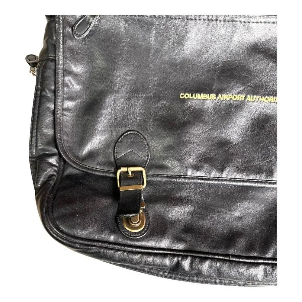 Large leather travel/work bag black with lots of pockets adjustable shoulder str